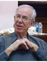 JOHN F. HAUGHT