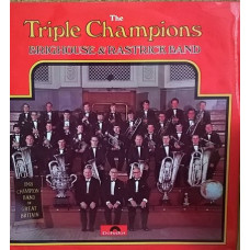 THE TRIPLE CHAMPIONS